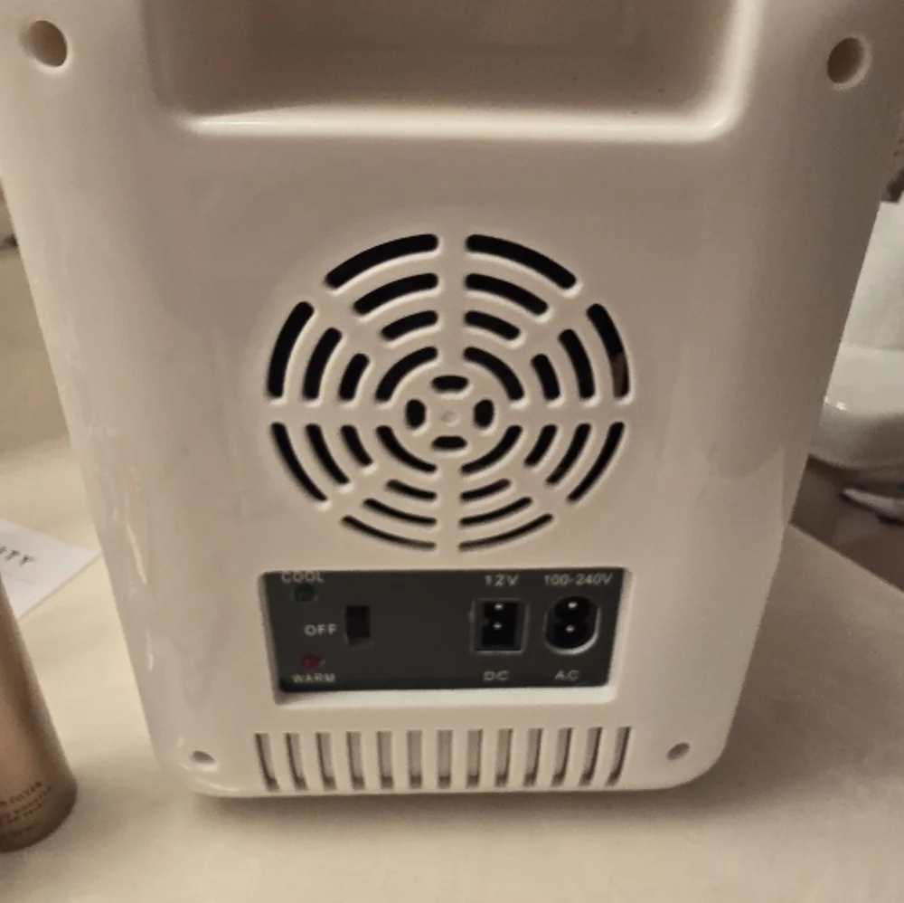 Modern White LED Vanity makeup fridge.